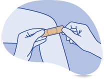 Colocación de Marca Band-Aid® Apósito en una herida.